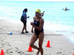 Betsmara Cruz takes first place for the women.